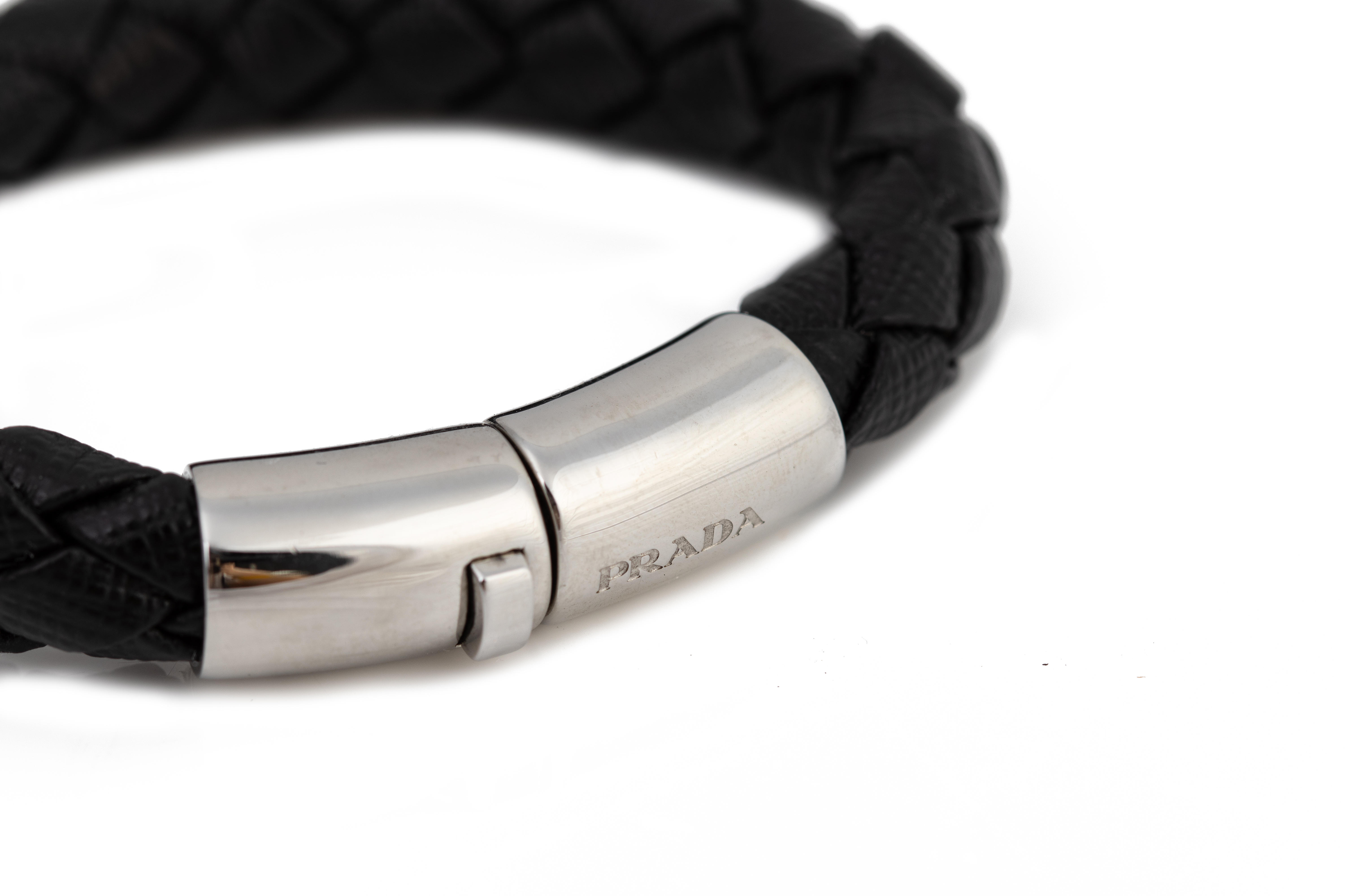 A PRADA BLACK BRAIDED LEATHER BANGLE - Image 2 of 2