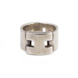 AN HERMES SILVER 'H' RING