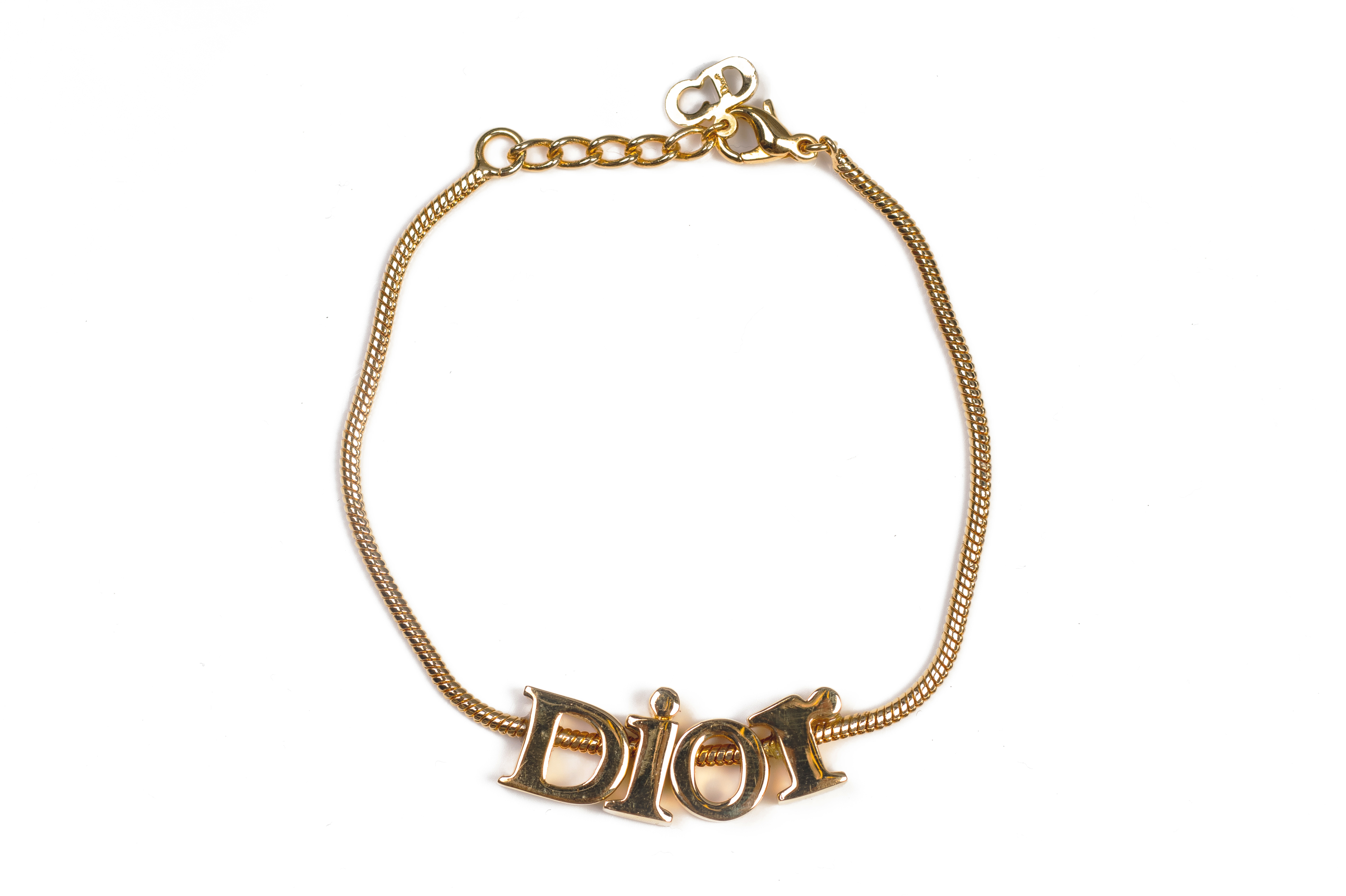 A CHRISTIAN DIOR GOLD-TONE BRACELET