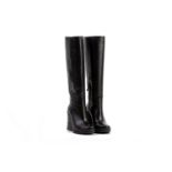 A PAIR OF PRADA BLACK LEATHER WEDGE BOOTS EU36