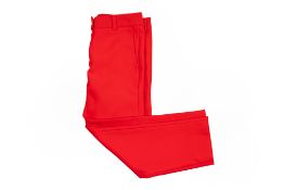 A PAIR OF CALVIN KLEIN RED TROUSERS