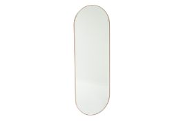 A POWDER PINK OVAL MIRROR