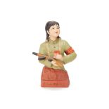 A PORCELAIN MODEL OF A CHINESE FEMALE SOLDIER