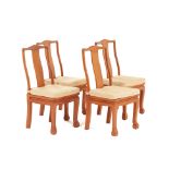 A SET OF FOUR THAI CARVED TEAK CHAIRS