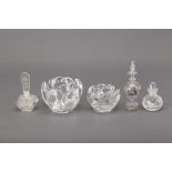 A GROUP OF GLASS SCENT BOTTLES AND CANDLE HOLDERS