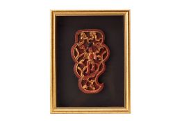 A FRAMED ANTIQUE CHINESE CARVING