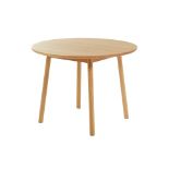 A CONTEMPORARY CIRCULAR OAK DINING TABLE