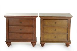 A PAIR OF BEDSIDE CHESTS OF DRAWERS