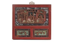 A CHINESE CARVED WOOD PANEL