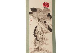 A CHINESE HANGING SCROLL OF A RED LOTUS