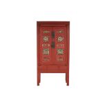 A PERANAKAN RED AND PARCEL GILT CABINET