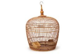 A LARGE WOODEN BIRD CAGE