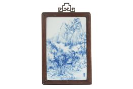 A BLUE AND WHITE PORCELAIN LANDSCAPE PLAQUE