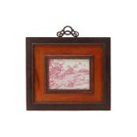 A SMALL PAINTED PORCELAIN PLAQUE, FRAMED