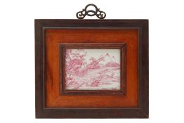 A SMALL PAINTED PORCELAIN PLAQUE, FRAMED