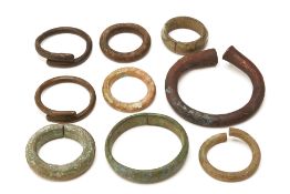 GROUP OF IRON ANKLETS