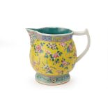 A YELLOW GROUND FAMILLE ROSE WATER JUG