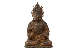 A PARCEL GILT BRONZE BUDDHA