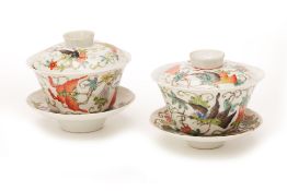 TWO CHINESE FAMILLE ROSE TEA BOWLS, COVERS AND STANDS