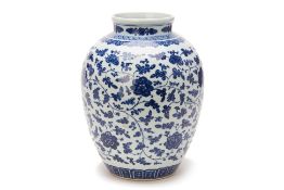 A BLUE AND WHITE SCROLLING FOLIATE VASE