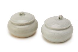 TWO QINGBAI GLAZED POTS AND COVERS