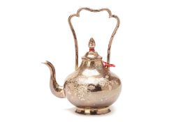 AN ORIENTAL WHITE METAL TEAPOT