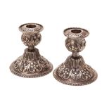 A PAIR OF MALAY SILVER CANDLESTICKS