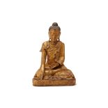 A BURMESE CARVED GILTWOOD BUDDHA