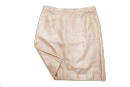 A CHANEL BEIGE LEATHER MINI SKIRT