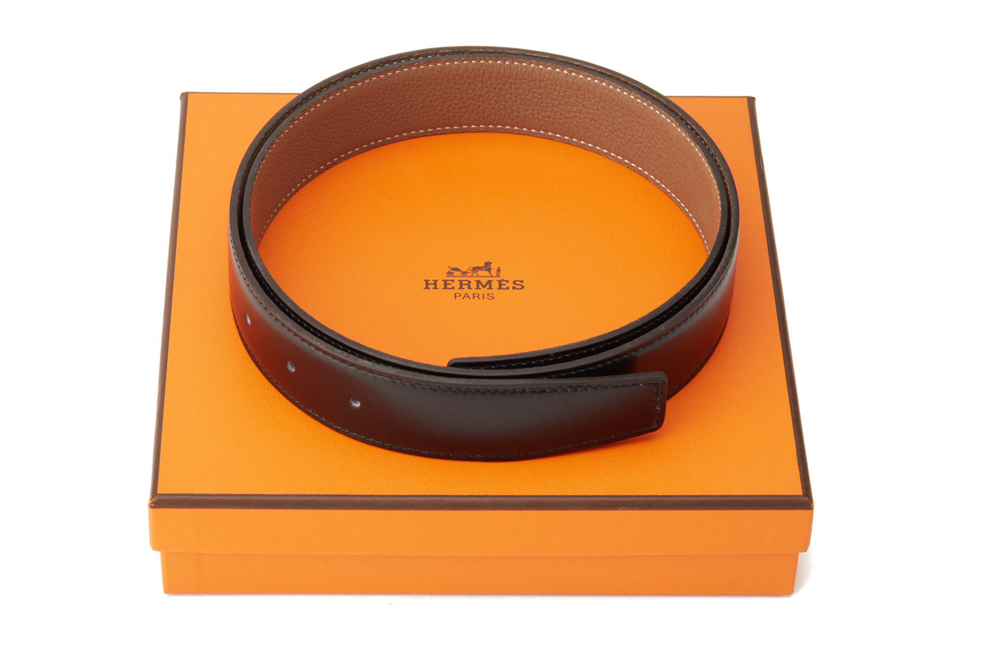 AN HERMES REVERSIBLE BLACK AND BROWN LEATHER BELT STRAP