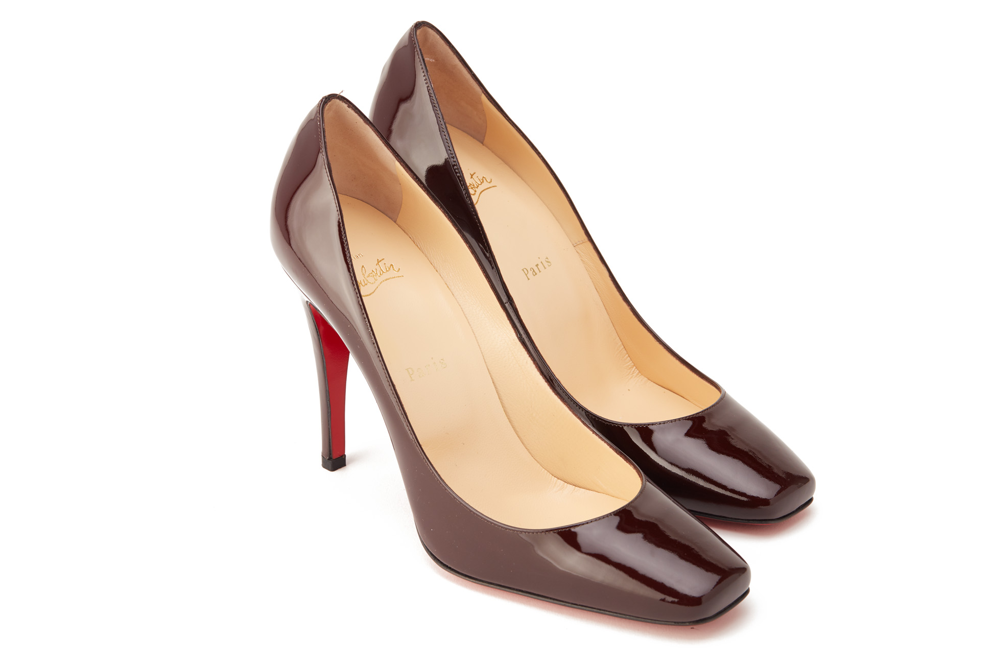 A PAIR OF CHRISTIAN LOUBOUTIN PLUM HEELS EU 40.5