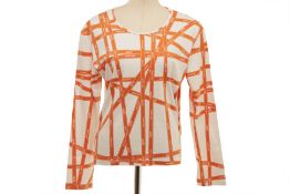 A HERMÈS RIBBON LONG SLEEVE TOP