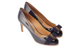 A PAIR OF SALVATORE FERRAGAMO 'VARA' NAVY PATENT HEELS EU41