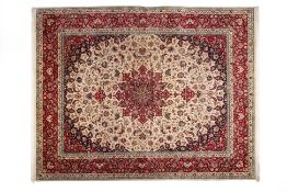 A LARGE CREAM GROUND ISFAHAN TYPE MEDALLION CARPET