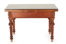 A 19TH CENTURY NORTH EUROPEAN WALNUT DRAW LEAF TABLE