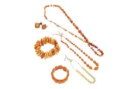 A GROUP OF AMBER COLOURED AND OTHER JEWELLERY