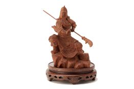 A CARVED ROSEWOOD FIGURE OF GUAN GONG