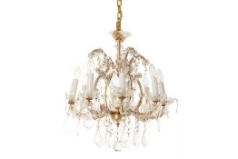 A GILT-METAL AND CUT GLASS CHANDELIER