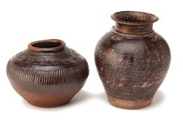 TWO SOUTHEAST ASIAN BROWN/BLACK GLAZED POTTERY JARS