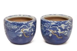A PAIR OF BLUE AND WHITE PORCELAIN JARDINIERES OR HIBACHI