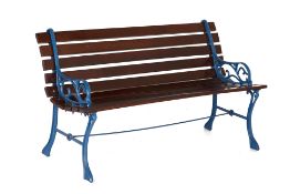 A CAST IRON AND SLATTED WOOD GARDEN BENCH