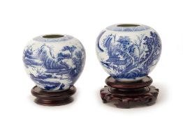 A PAIR OF SMALL JAPANESE BLUE AND WHITE PORCELAIN WATER POTS