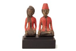 AN INDONESIAN BRONZE ALLOY LORO BLONYO COUPLE