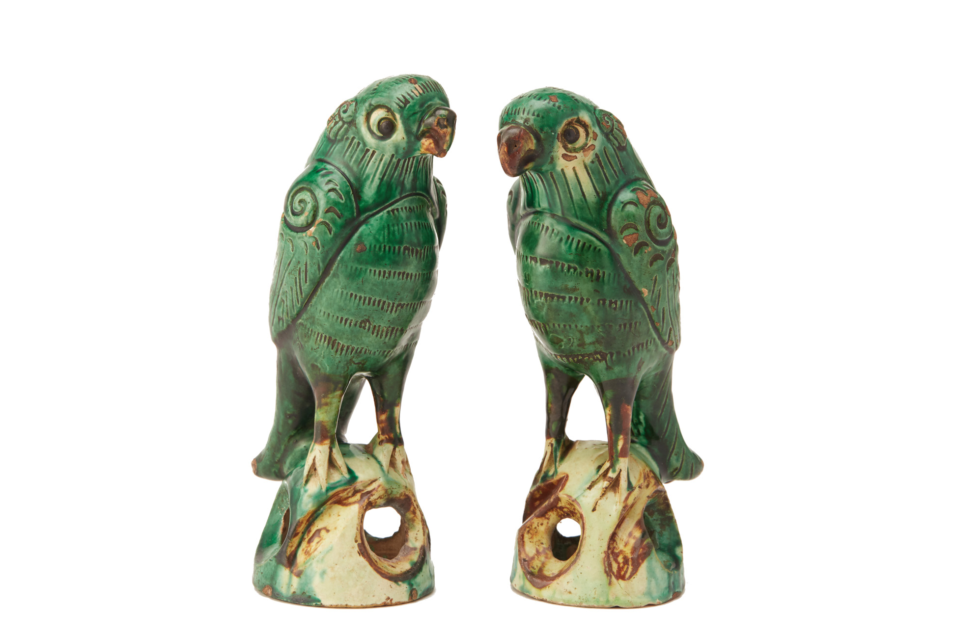 A PAIR OF CHINESE GREEN GLAZED PARROT JOSS STICK HOLDERS