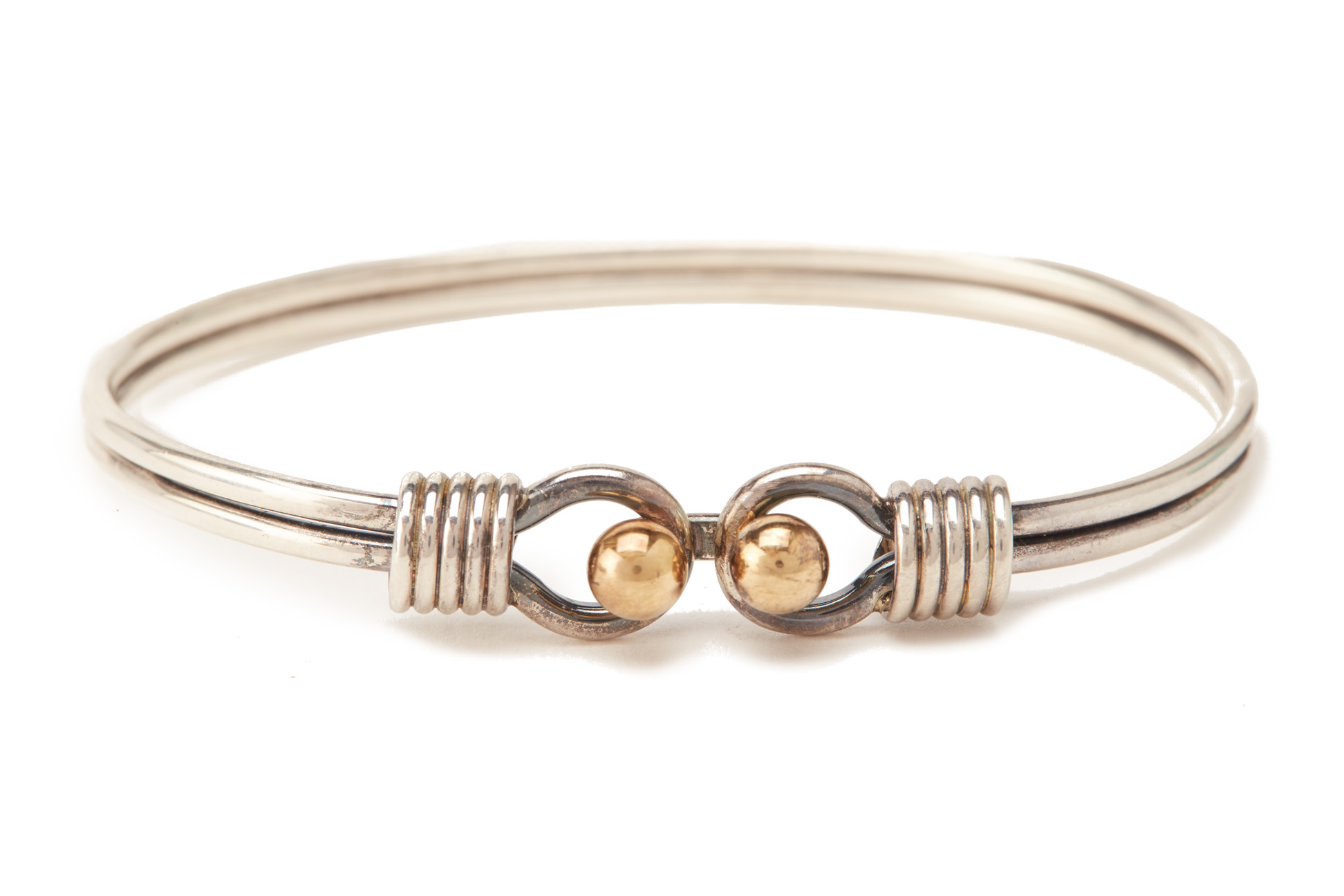 A TIFFANY & CO SILVER AND GOLD BANGLE