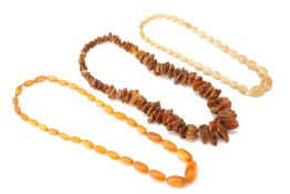A GROUP OF THREE ORGANIC BEAD NECKLACES