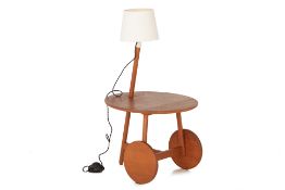 AN UNUSUAL CIRCULAR SIDE TABLE WITH LAMP