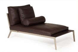 A BROWN LEATHER CHAISE LONGUE