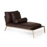A BROWN LEATHER CHAISE LONGUE