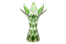 A BOHEMIAN GREEN FLASHED AND CUT GLASS VASE